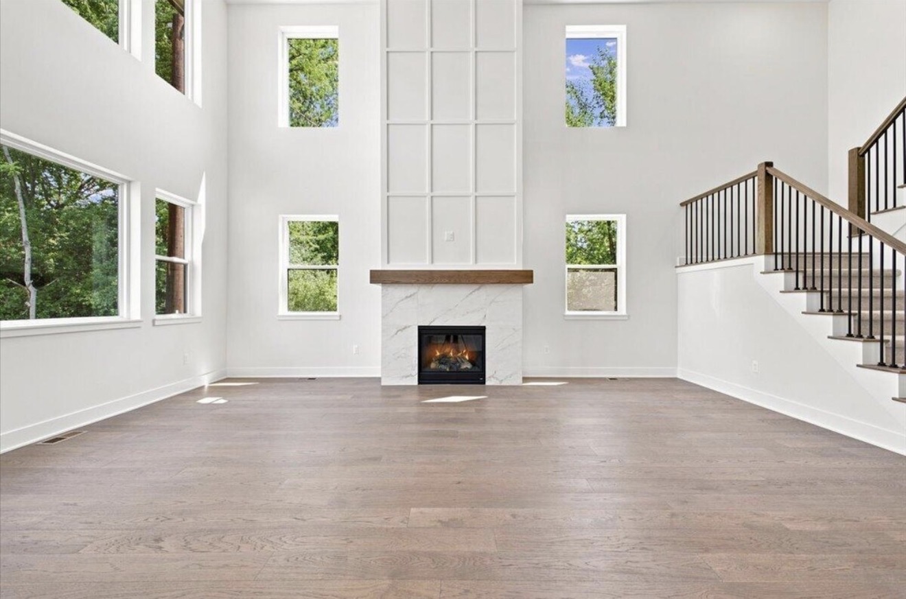 Two-story great room centered on the fireplace