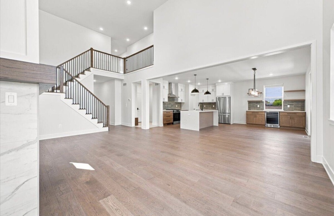 Open-concept great room, kitchen and dining area
