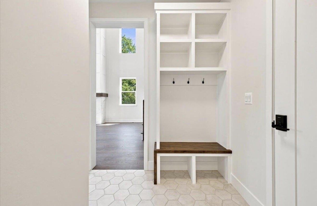 Mudroom with built-in bench, cubbies and storage